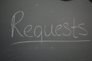 Chalkboard with the word "Requests" written in white.